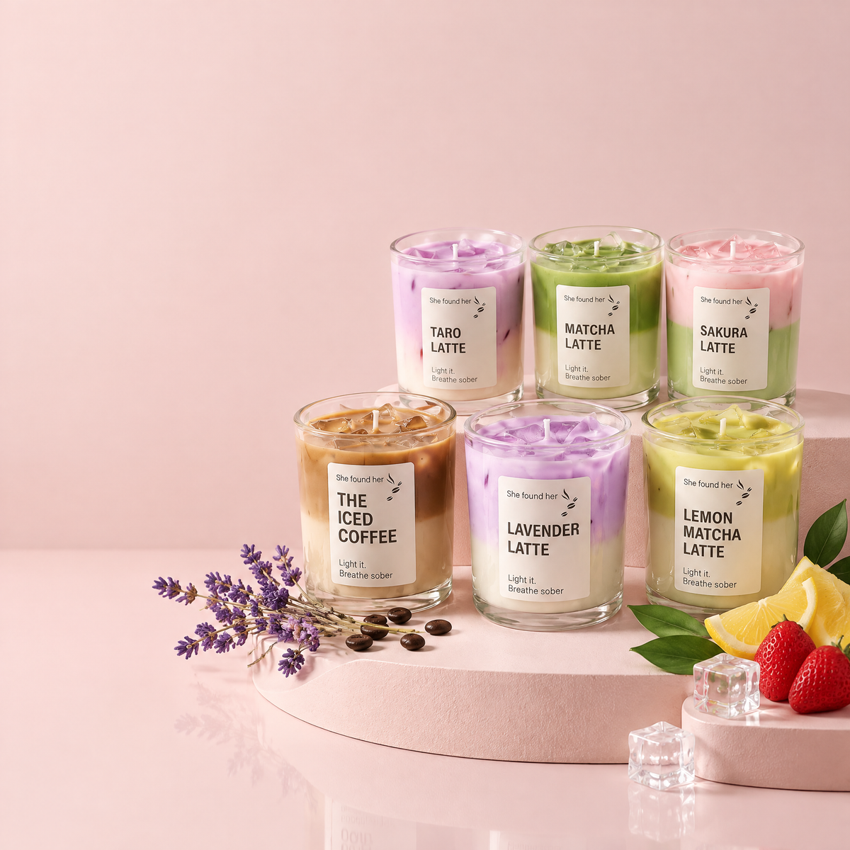 Six latte soy candles on blush pink pedestals