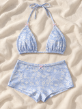 Blue floral shorts set flat lay