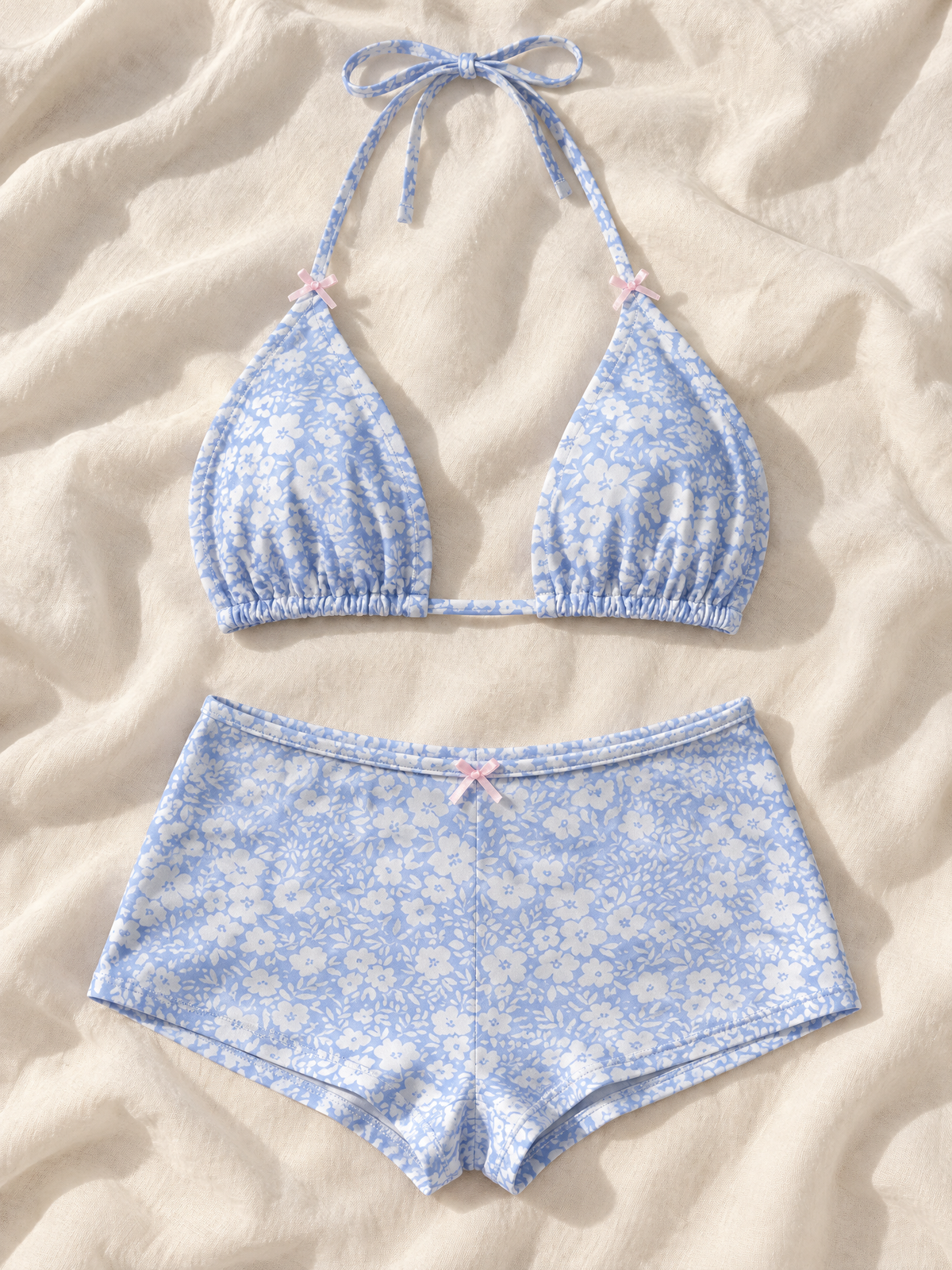 Blue floral shorts set flat lay