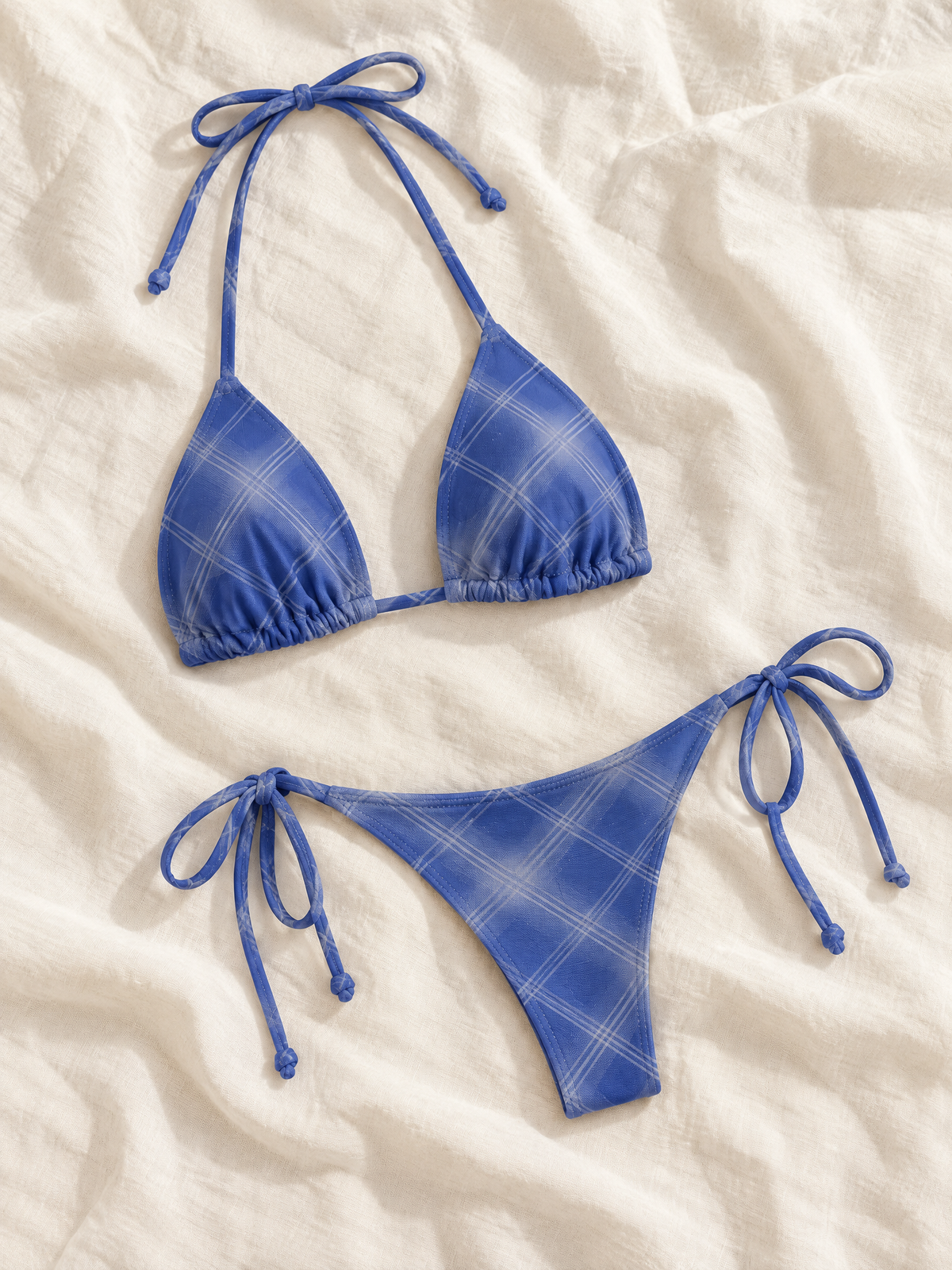Blue plaid triangle bikini flat lay