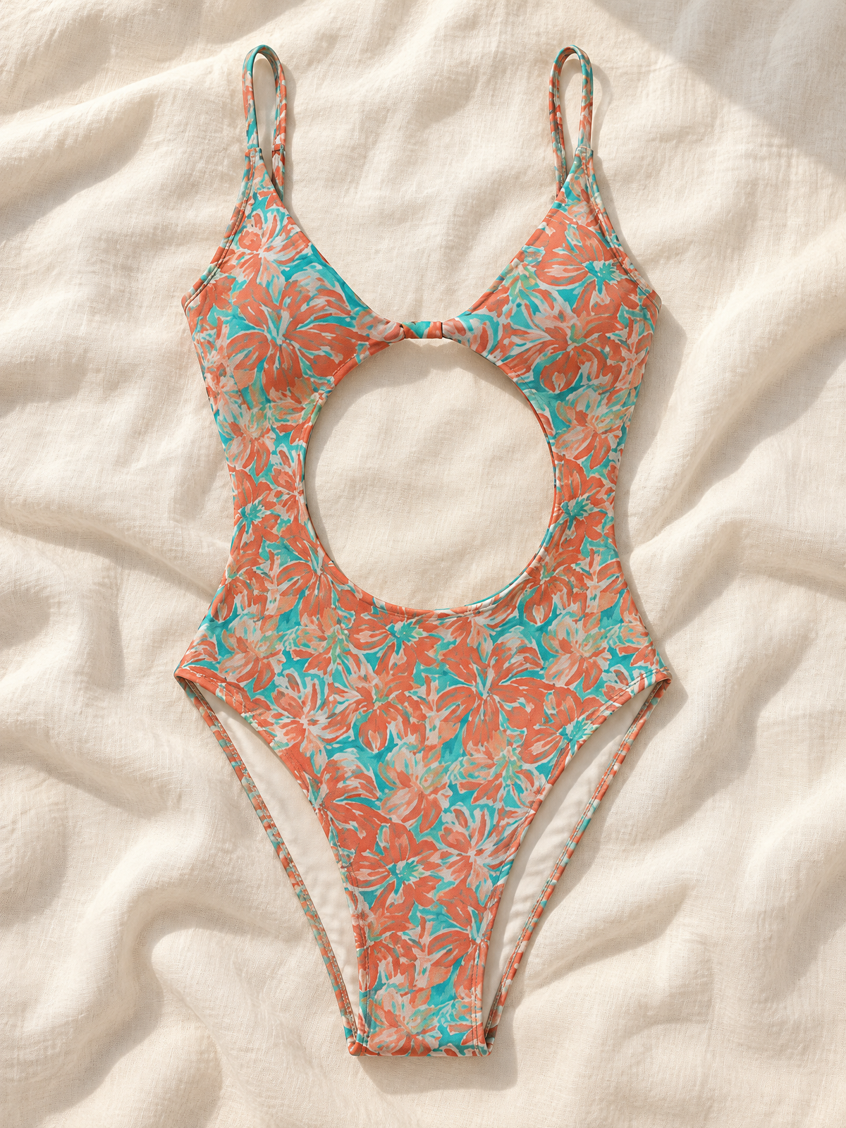 Coral floral cutout one piece flat lay