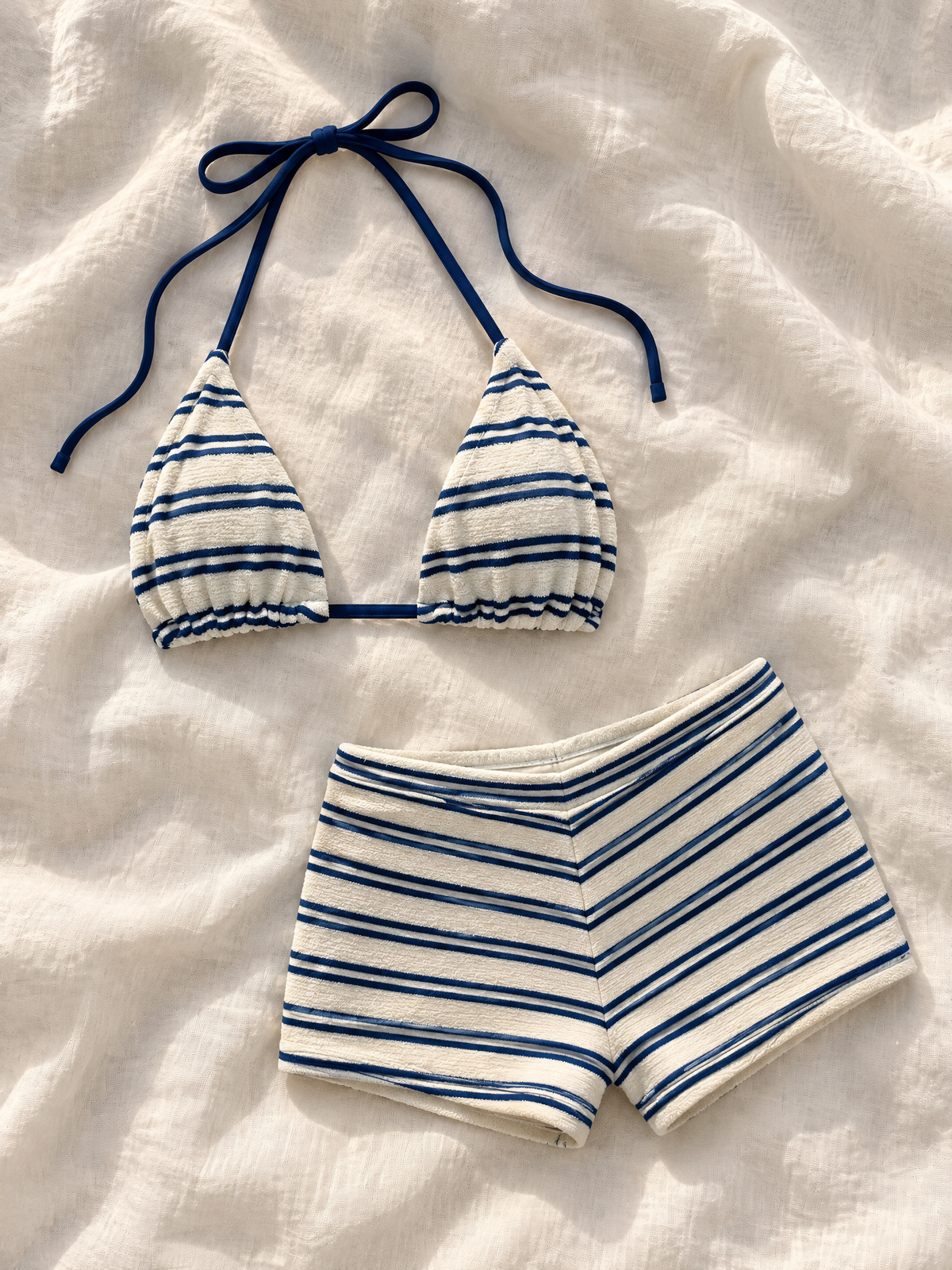 Navy stripe shorts set flat lay
