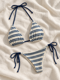 Navy stripe tie bikini flat lay