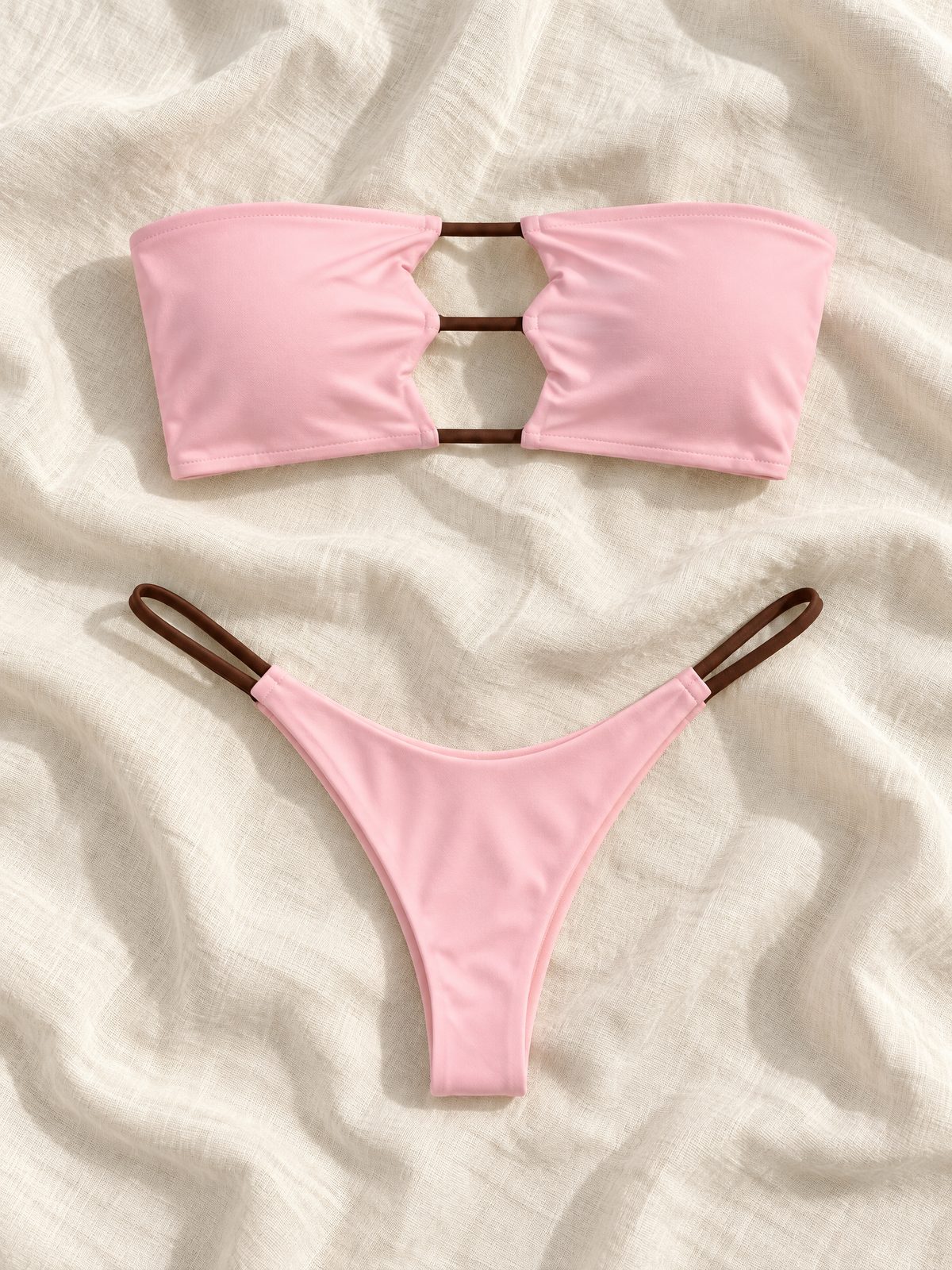 Pink brown cutout bandeau bikini flat lay