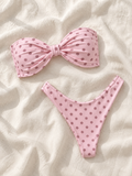 Pink daisy bandeau bikini flat lay